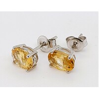9 Carat White Gold Claw Set Yellow Topaz Stud Earrings