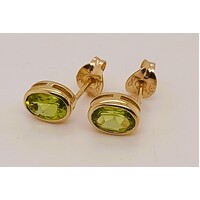 9 Carat Yellow Gold Oval Bezel Set Peridot Stud Earrings