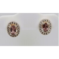 Sterling Silver Oval Amethyst and Cubic Zirconia Stud Earrings
