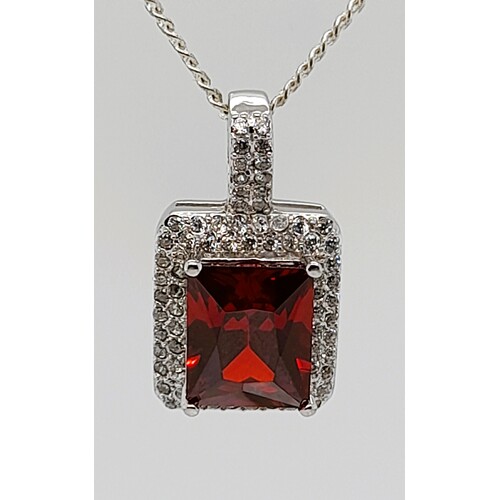 Sterling Silver Emerald Cut Created Ruby and Cubic Zirconia Pendant
