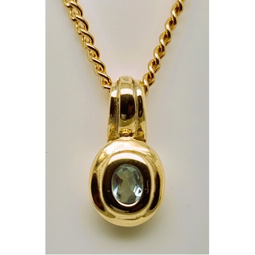 9 Carat Yellow Gold Oval Blue Topaz Pendant