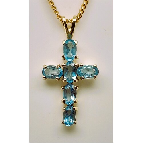 Blue topaz cross pendant on sale