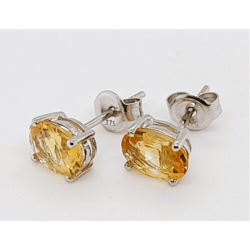 9 Carat White Gold Claw Set Yellow Topaz Stud Earrings