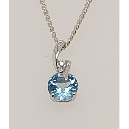 9 Carat White Gold Blue Topaz and Diamond Pendant