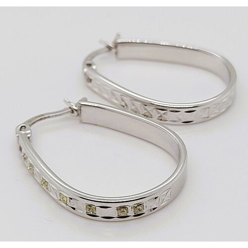 Sterling Silver Cubic Zirconia Oval Hoop Earrings