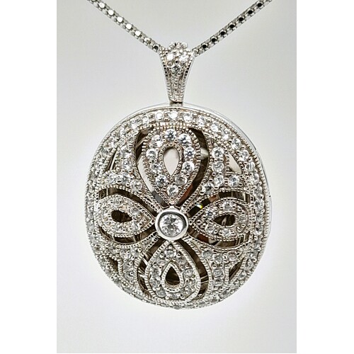 Sterling Silver Cubic Zirconia Puffed Oval Locket