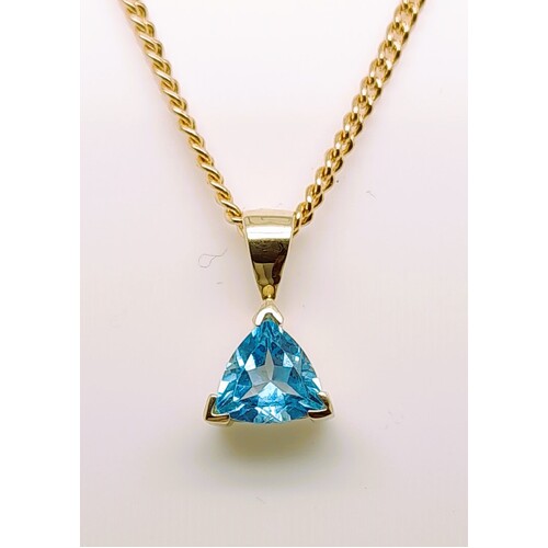 9 Carat Yellow Gold Claw Set Blue Topaz Pendant