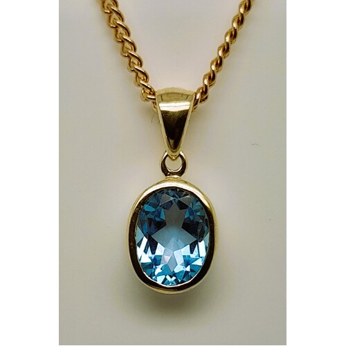 9 Carat Yellow Gold Oval Blue Topaz Pendant